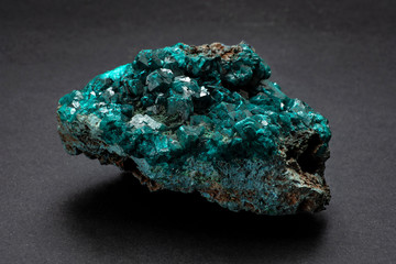 Sample of Dioptase mineral from Congo. An intense emerald-green to bluish-green copper...