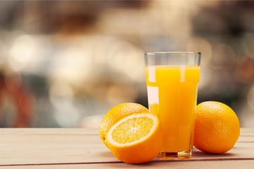 Orange Juice in glass on background