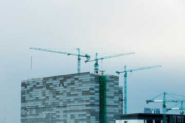 Building crane and buildings under construction.