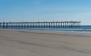 Fishing Pier with Calm Waves