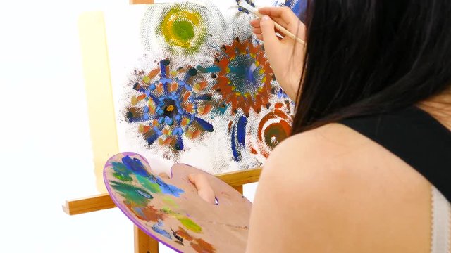 OTS anonymous Artist at easel painting