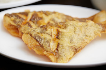 Deep fried flatfish on plate 
