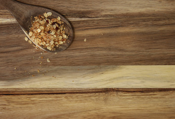 Granola on a wooden spoon 