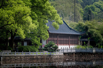 Fototapeta na wymiar WUHAN, HUBEI/CHINA- MAR 31-2019: The Chinese house is located in the park. For the traveler relaxing. This park is located i n the center of the city.