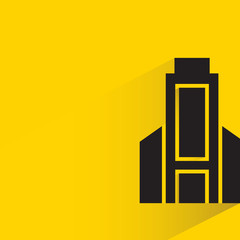 tower building with drop shadow on yellow background vector