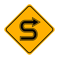 arrow road sign in yellow signage