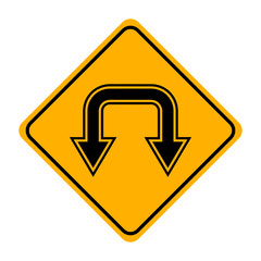 arrow road sign in yellow signage