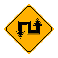 arrow road sign in yellow signage