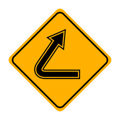 arrow road sign in yellow signage