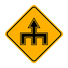 arrow road sign in yellow signage