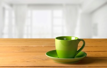 Wooden board stand on tablecloth over grunge background