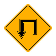 arrow road sign in yellow signage