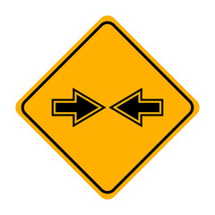 arrow road sign in yellow signage