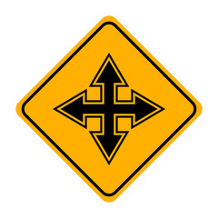 arrow road sign in yellow signage