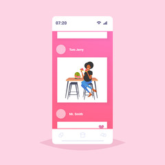 pregnant woman eating watermelon fresh fruit african american girl sitting at table pregnancy and motherhood concept smartphone screen mobile application flat full length