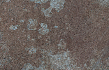 The texture of the stone. Dark background. Natural relief pattern