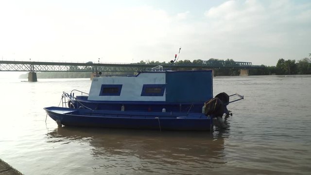 Boat on river Sava in Brcko district, Bosnia and Herzegovina. River Sava is a natural border between Bosnia and Croatia