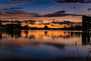 LAKE MIRRORING SUNSET