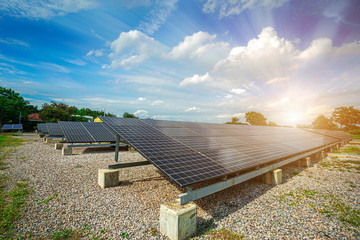 Photovoltaic modules solar power plant and blue sky sunset background, Alternative energy concept.