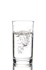 Glass with water on a white background