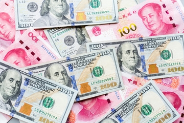 US dollar and Chinese yuan bank note. Trade war and conflict between two big countries. USA and China relationship. Concept. Copy space leader