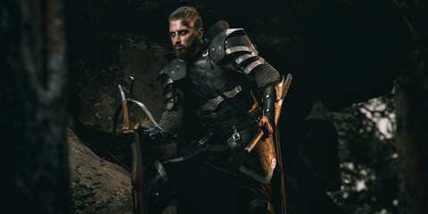 Knight with sword and crossbow