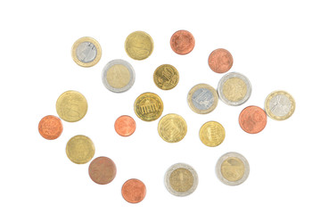 Scattered euro coins isolated on a white background close up