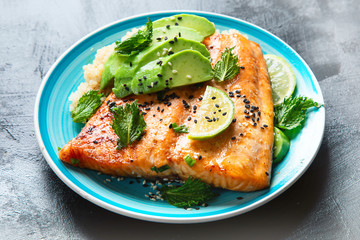 Grilled salmon with avocado, quinoa and sesame