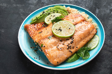 Grilled salmon with avocado, quinoa and sesame