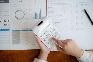Obraz premium Accountant working with data documents calculating on business report.