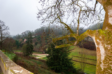 Limeuil, in the Dordogne-Périgord region in Aquitaine, France. Medieval village with typical houses perched on the hill, overlooking the confluence of the Dordogne and Vézère rivers.