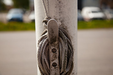 a flagpole with rope wrapped