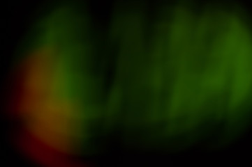 abstract Bokeh blurred background pattern in green and red colors. Wallpapper backdrop