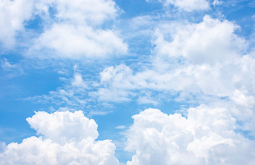The beauty of the sky with clouds and the sun in summer.