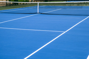 Whole blue tennis court, synthetic rubber lawn