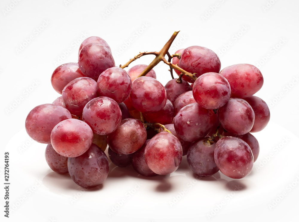 Wall mural red grapes isolated over the white background.