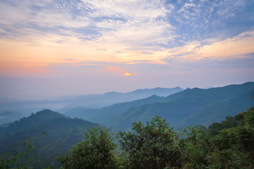 Landscape of natural layer mountains range with sunrise
