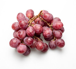 Red Grapes isolated over the white background.