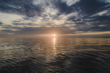  Dazzling morning sun floating in the deep sea