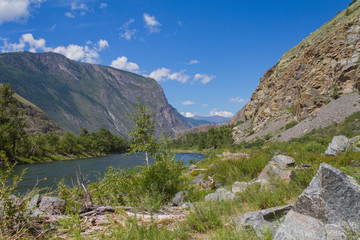Chulyshman River in mountains valley. Picturesque landscape of Altai Mountains. Summer time.