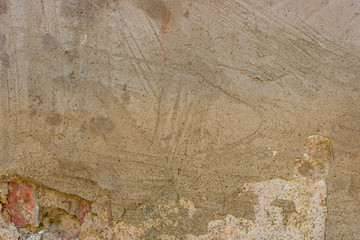 Texture, wall, concrete, it can be used as a background. Wall fragment with scratches and cracks