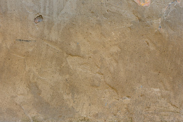 Texture, wall, concrete, it can be used as a background. Wall fragment with scratches and cracks