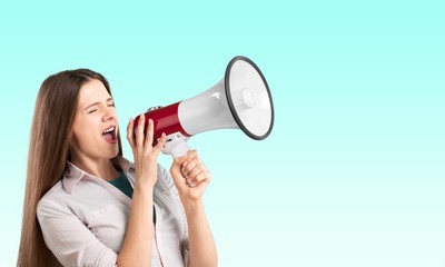 Portrait of woman holding megaphone, dressed in pin-up style