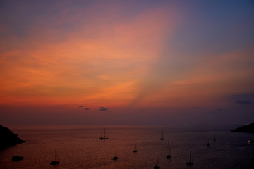 Sunset about sea with boat Thailand Phuket