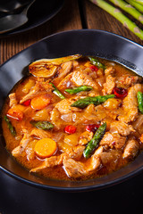 colorful turkey fricassee with asparagus and paprika