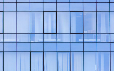 The walls of the house of plastic panels and glass as a background