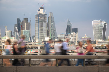 London cityscape with pedestrian in motion at the foreground