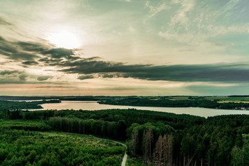 sunset over green field