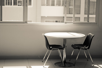 interior of a room with chairs and table