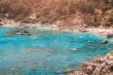 Obraz premium Popular tourist attraction on Rhodes island - azure lagoon known as Anthony Quinn Bay. Sea travel and summer paradise concept